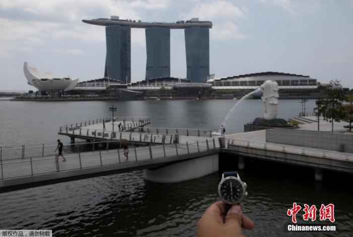 新加坡强制餐饮场所员工戴口罩 违者或面临高额罚款